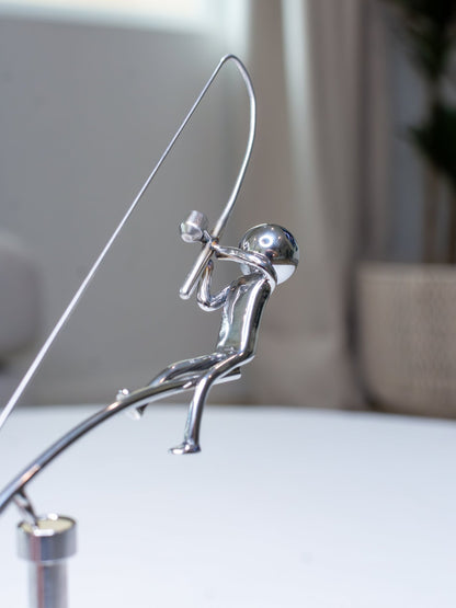 Balanssculptuur van de Visser